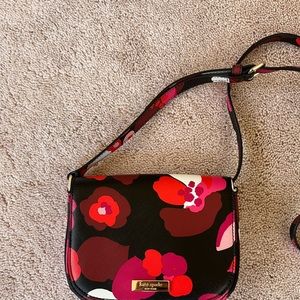 black red pink and white crossbody kate spade bag
